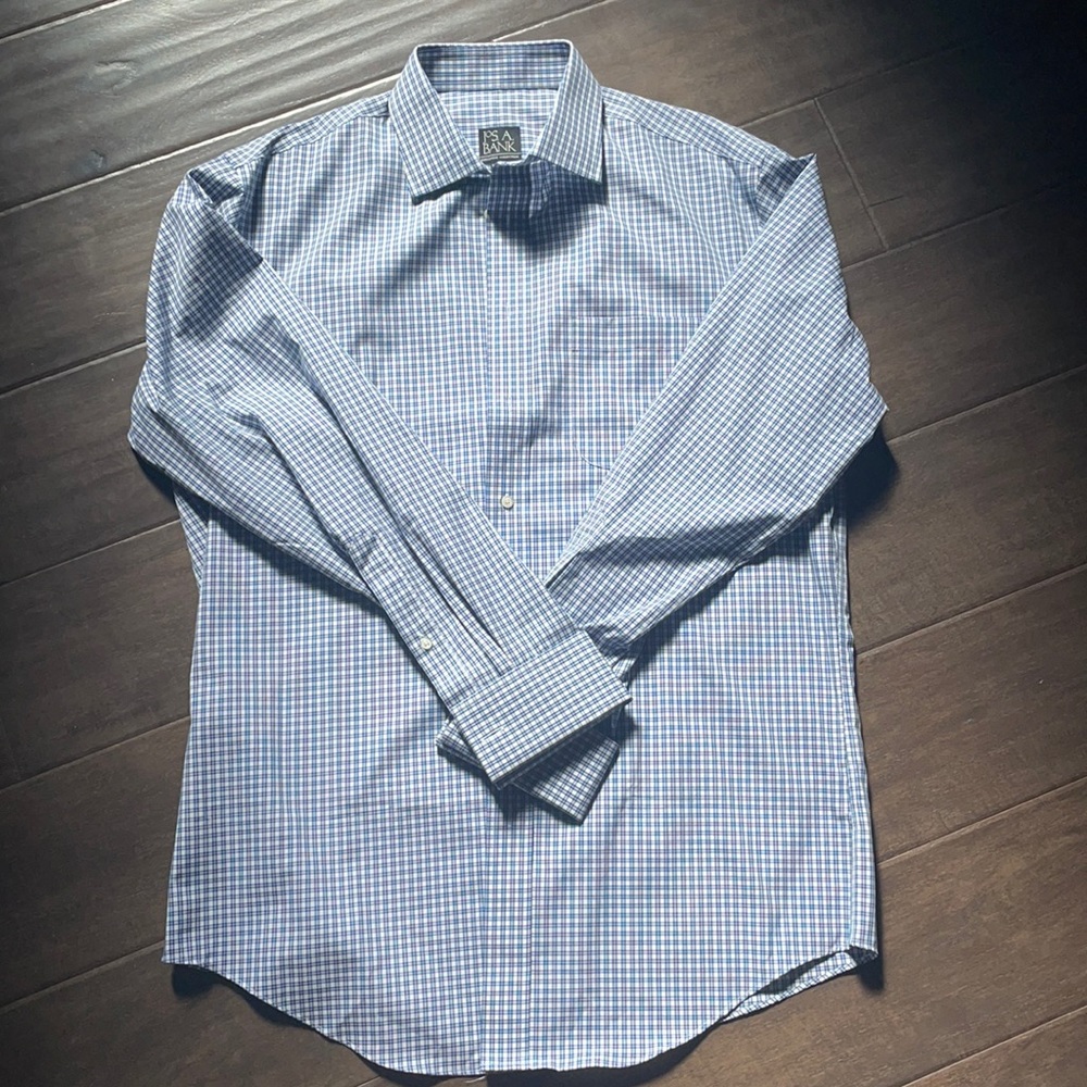 Blue button up dress shirt.